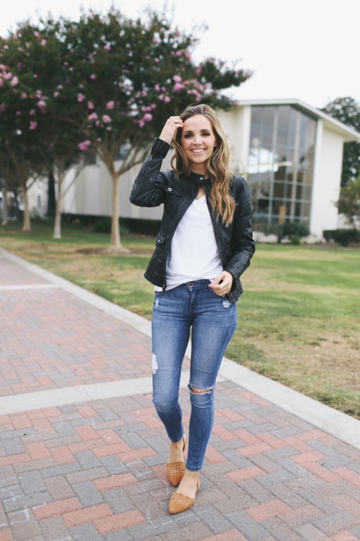 white tee and a leather jacket