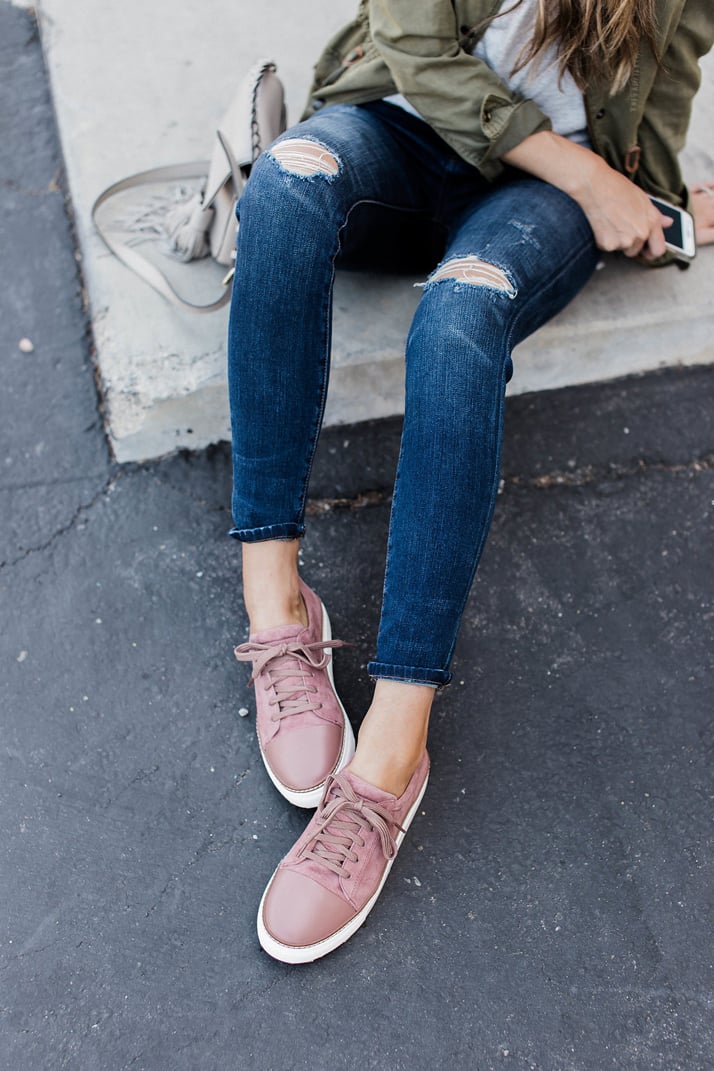 pink sneakers and jeans