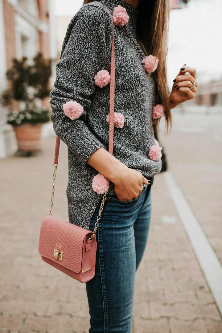 turn an ordinary sweater into a cute pom pom sweater!