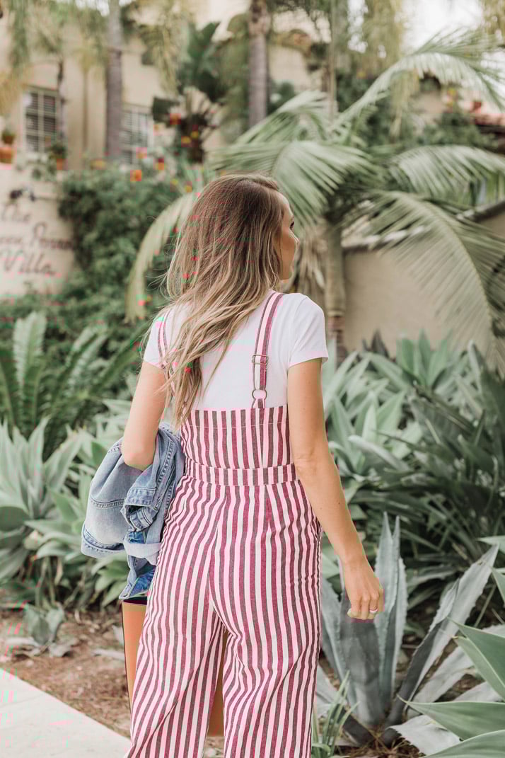 the back of this jumpsuit is cute and flattering, and I love that the straps are adjustable