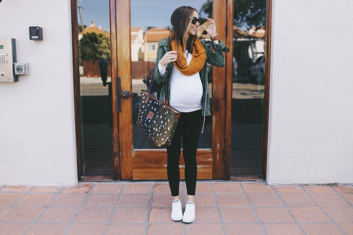 Dress up your leggings with a jacket, scarf, and cute sneakers