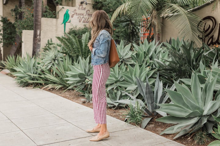 layer your jumpsuits with a denim jacket for spring!