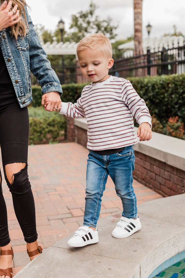 Striped tee and black and white adidas toddler sneakers