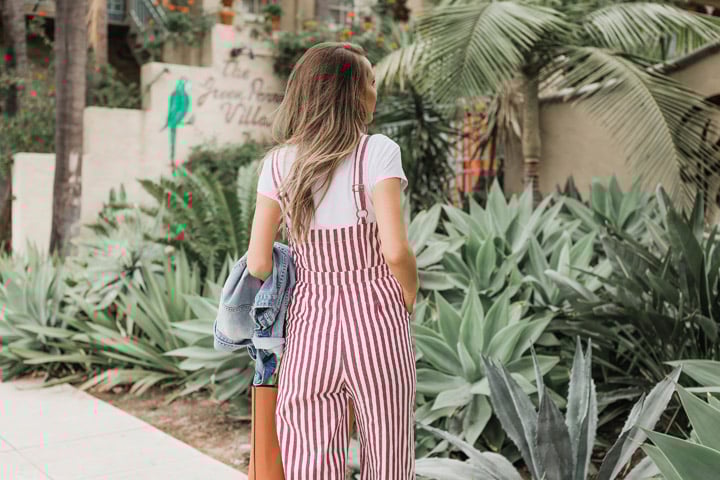 toss a white tee under a jumpsuit!