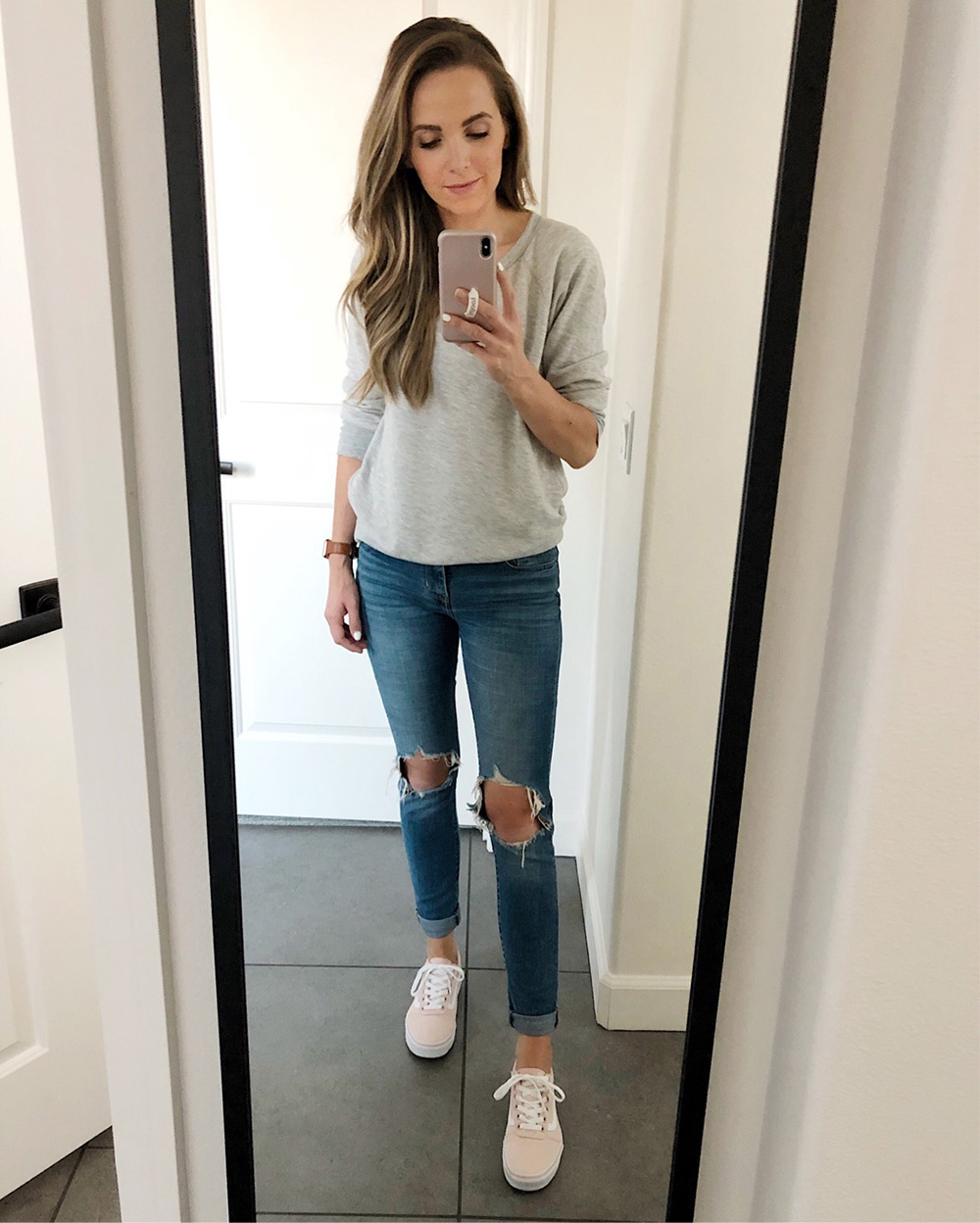 grey sweatshirt and jeans