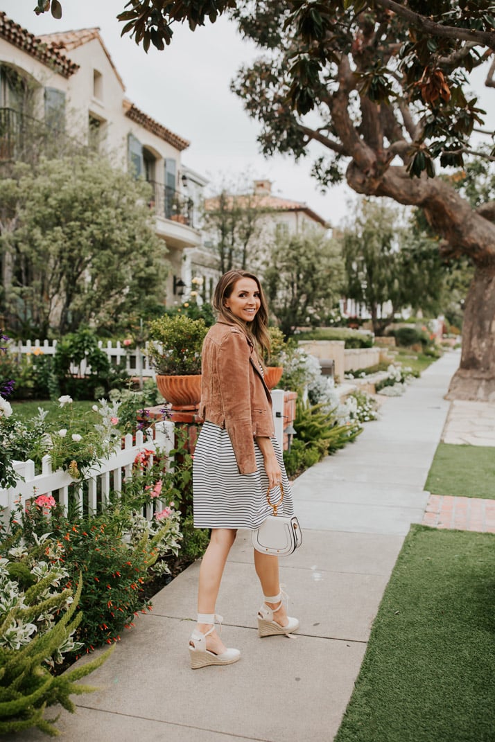 this striped dress is flattering, comfortable, and so cute