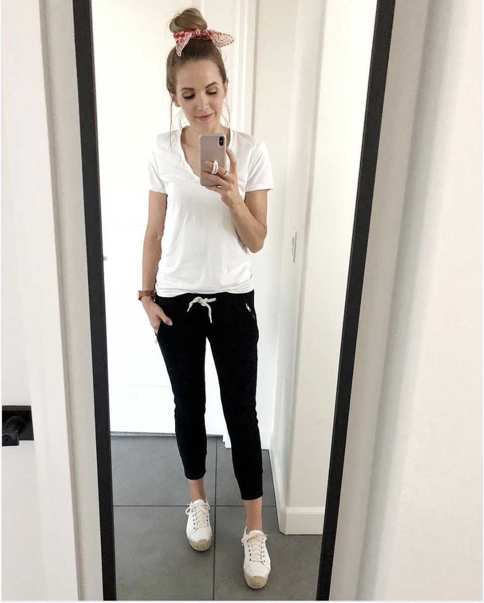 black joggers and white tee