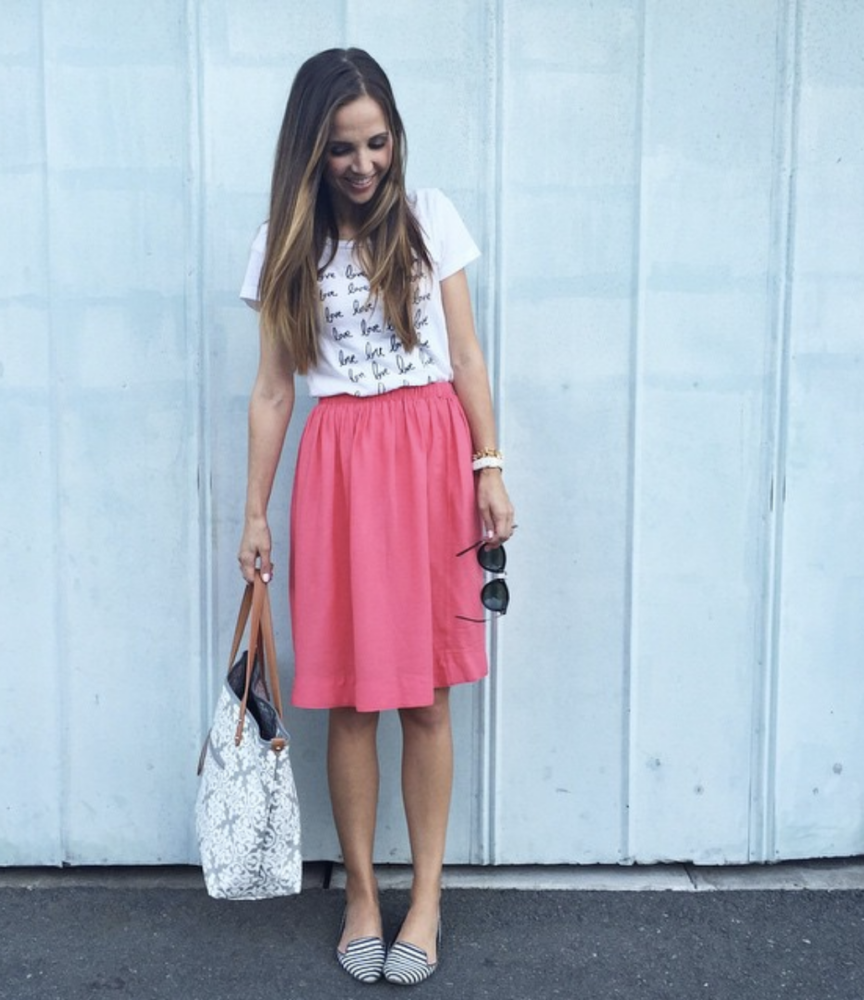 pink skirt and graphic tee