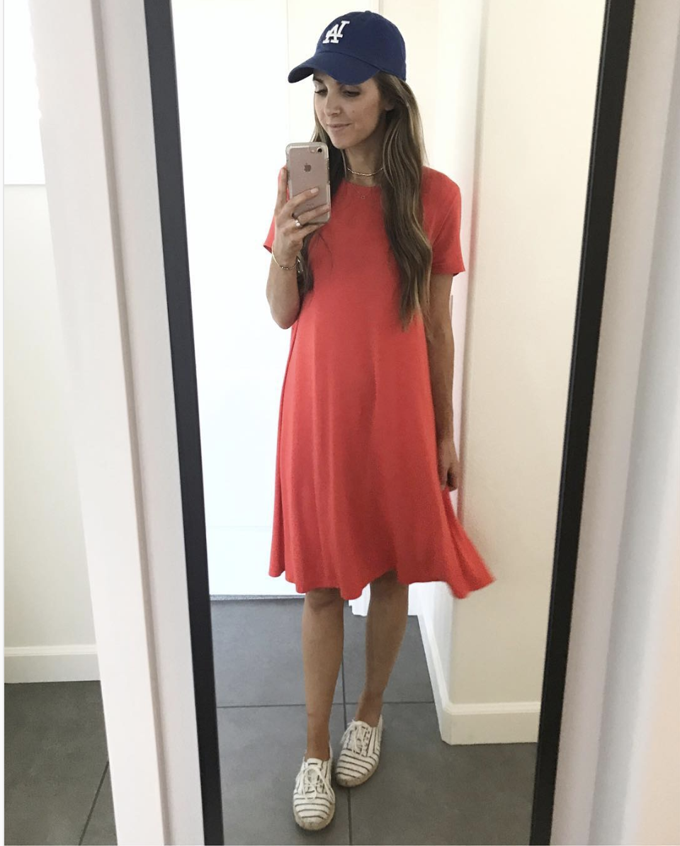 red swing dress with sneakers