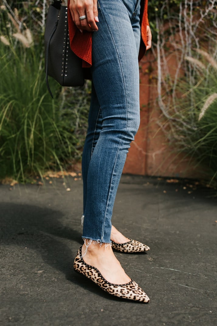 leopard flats and frayed hem jeans