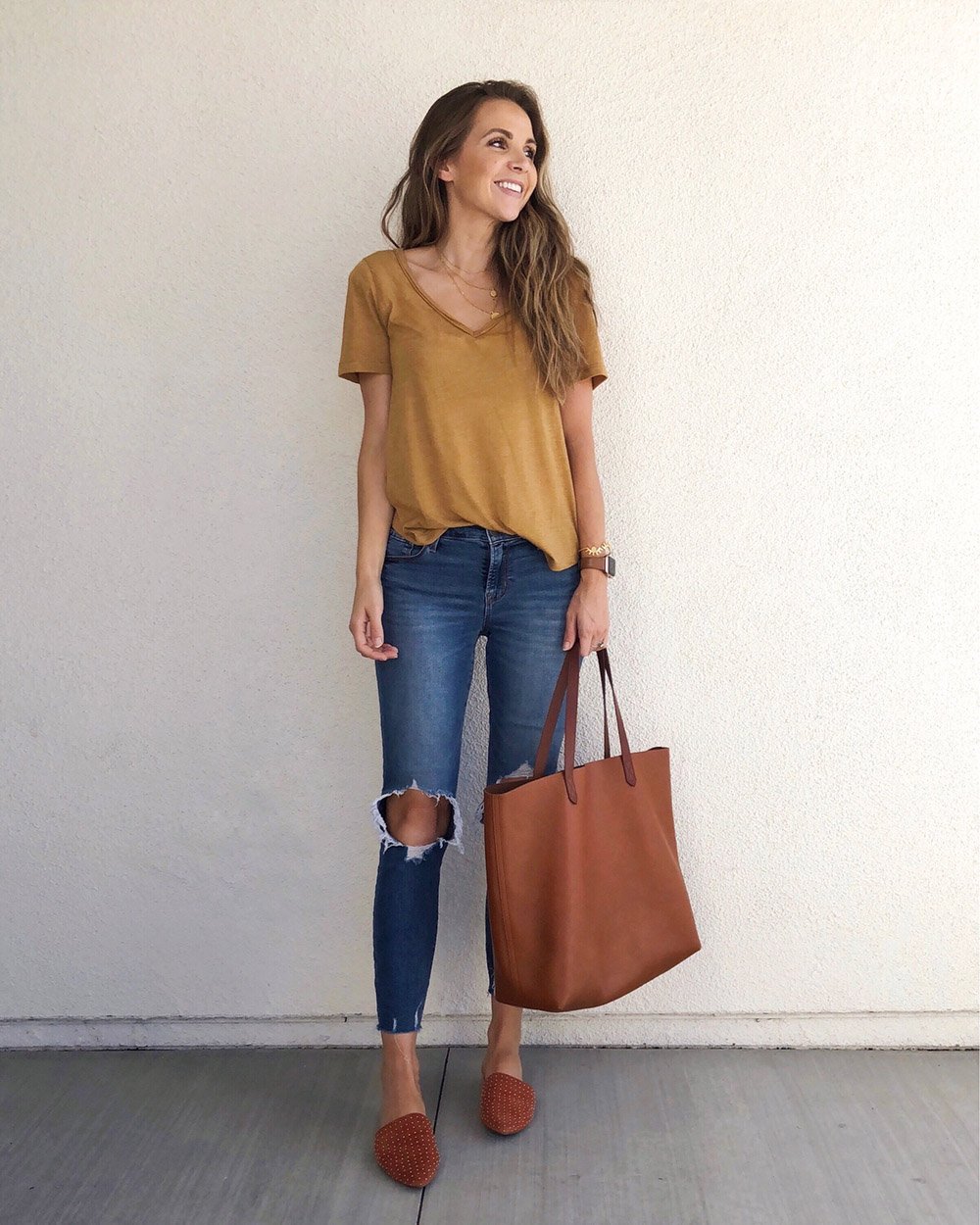 mustard yellow top and jeans