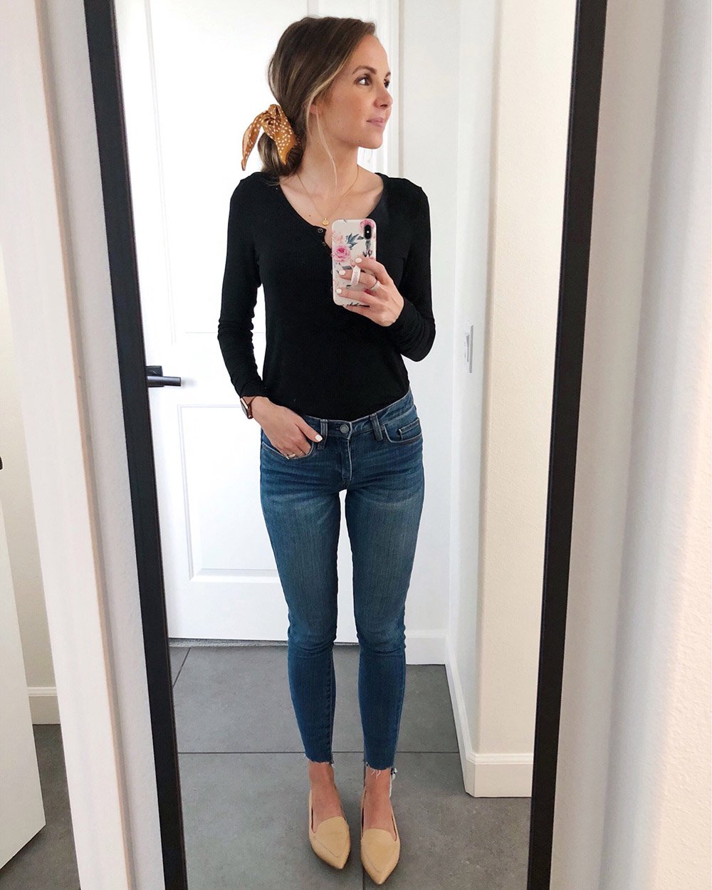 black henley top and jeans