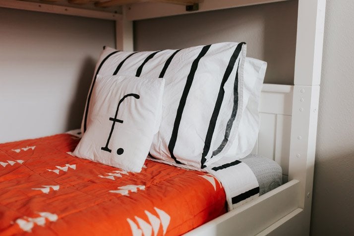 orange, black, and white bedding