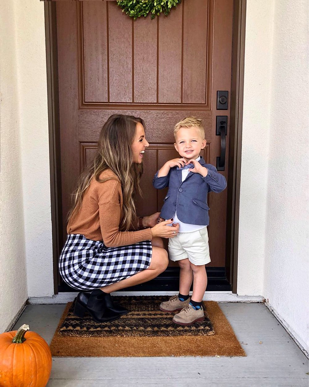 camel sweater an buffalo plaid skirt