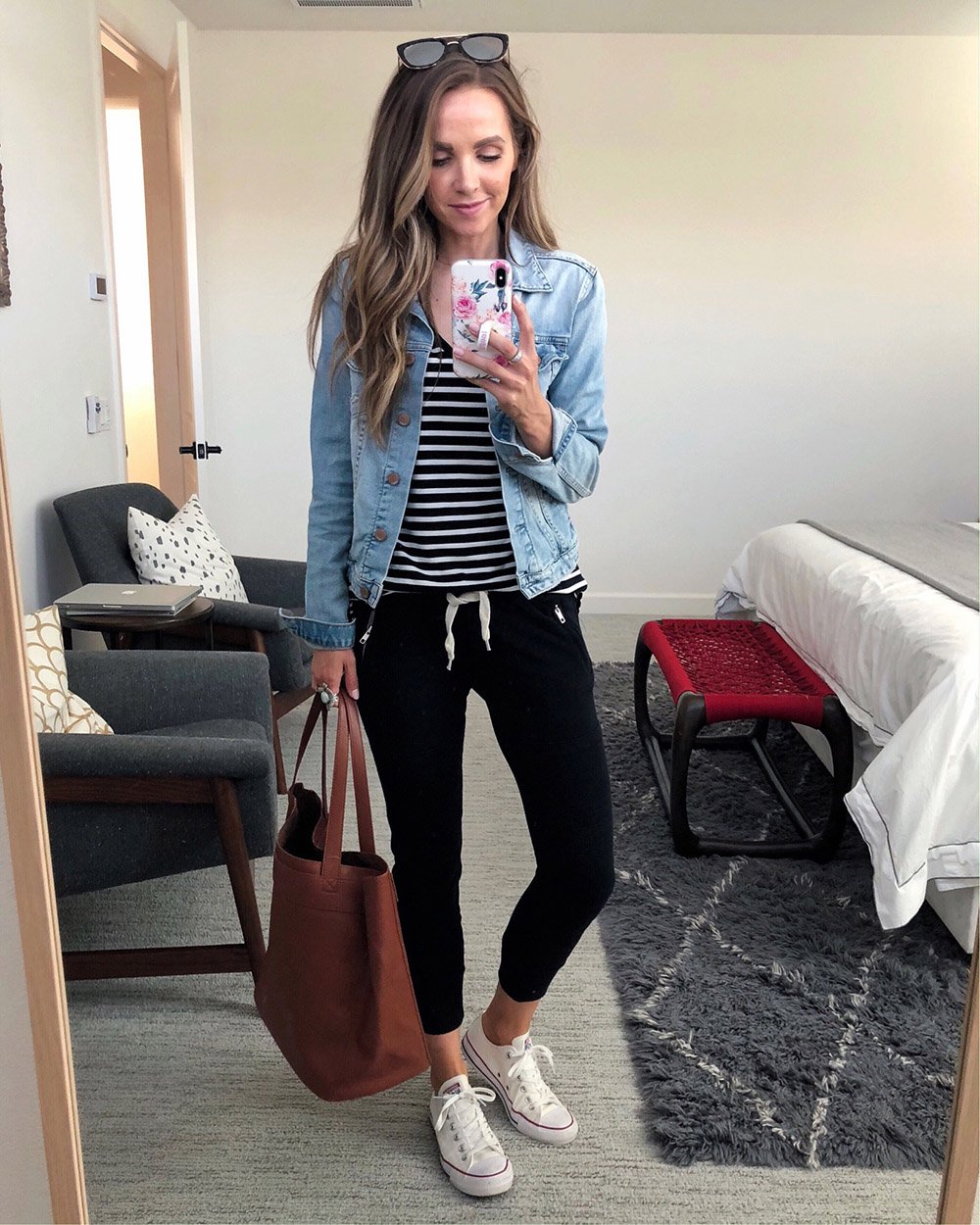 denim jacket and black joggers