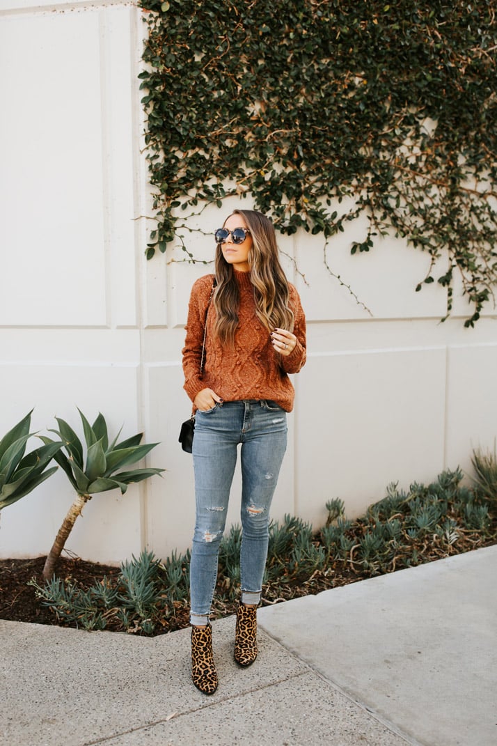 rust sweater with leopard boots