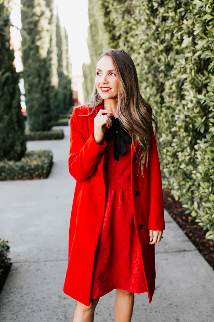 red dress with black neckline bows