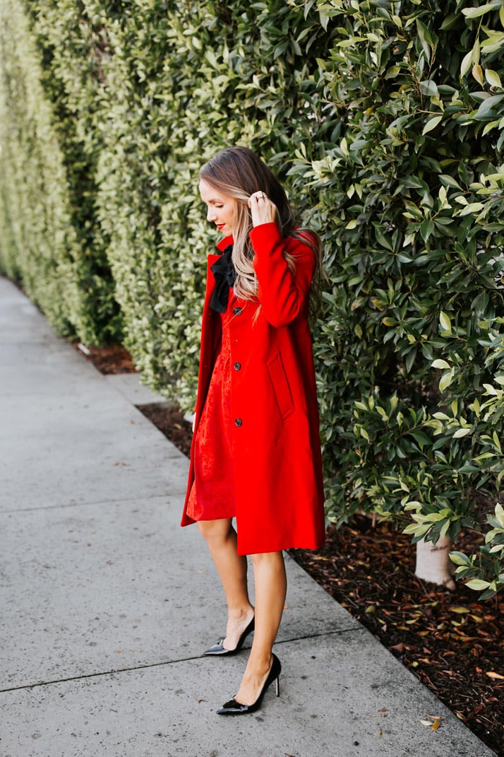 red dress with red coat and black heels