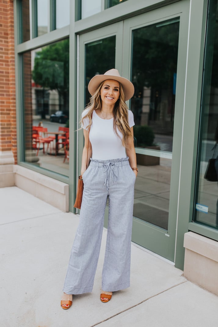 white bodysuit and striped linen pants