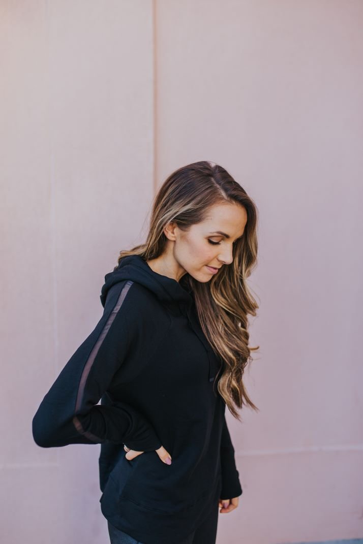 black sweatshirt with mesh strip down the sleeve