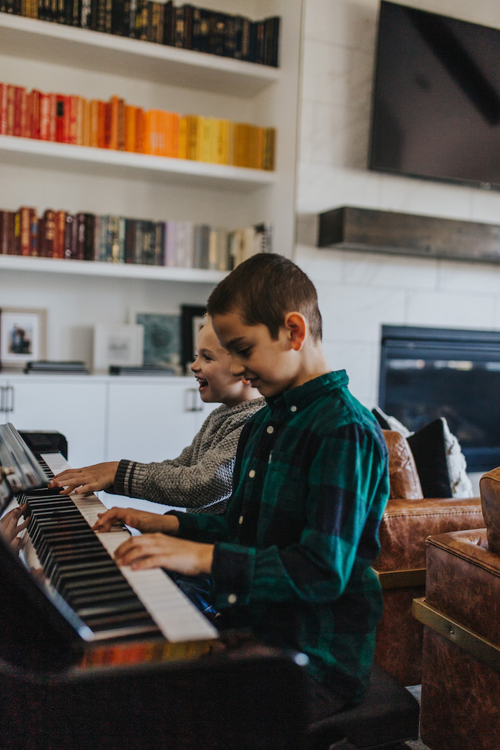boys playing the piano