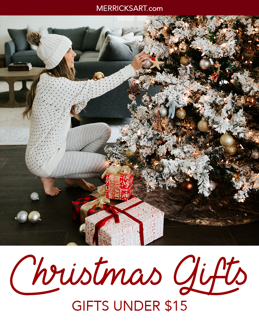 woman decorating Christmas tree