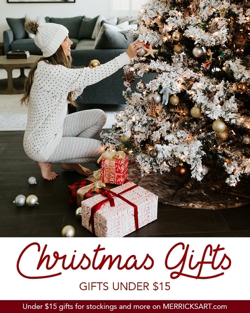 woman decorating Christmas tree