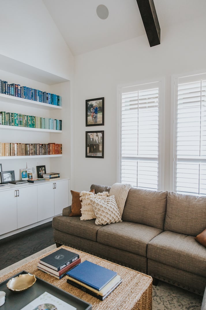 rainbow bookshelf and sectional couch