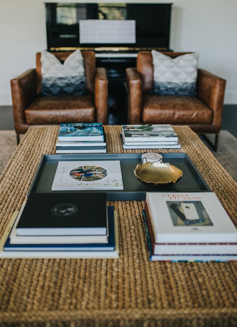 coffee table books and wicker coffee table