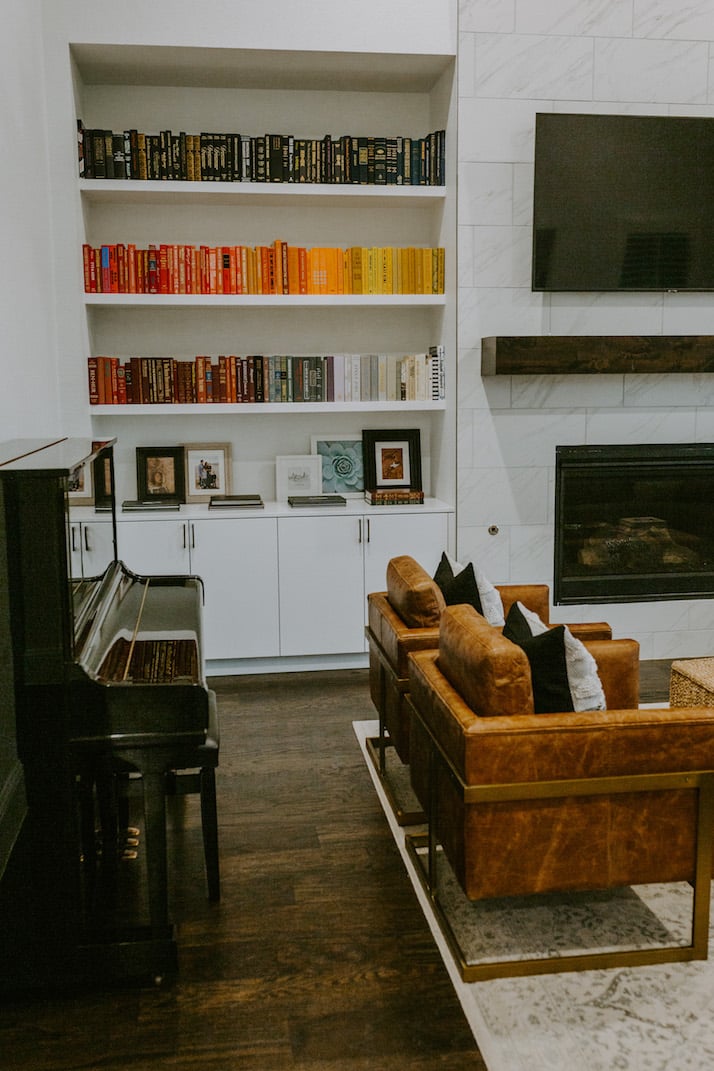 rainbow bookshelf with reds and oranges