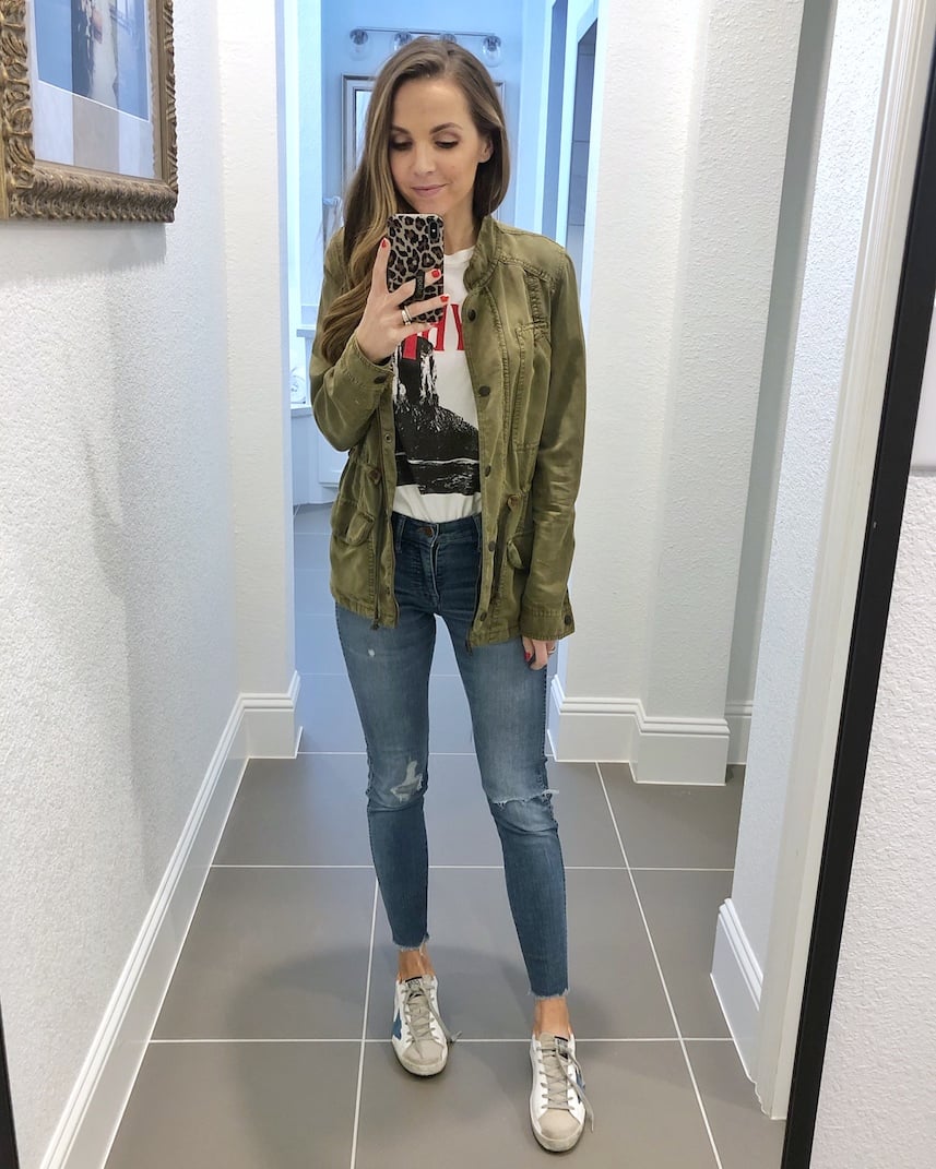 olive jacket with graphic tee