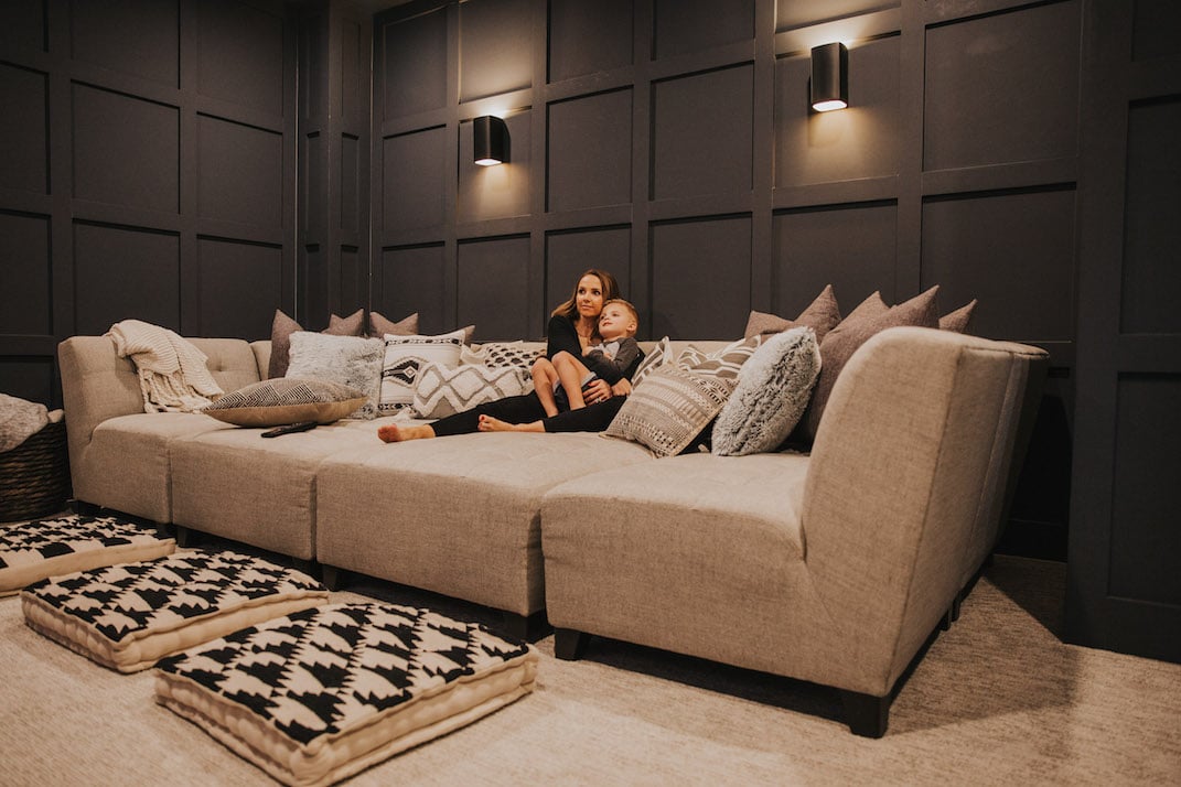 modular couch and millwork wall paneling
