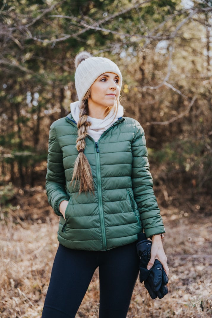 green puffer jacket running