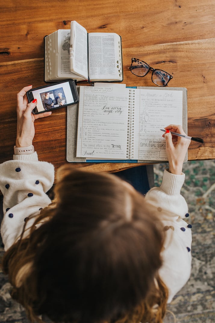 journal with scriptures and phone