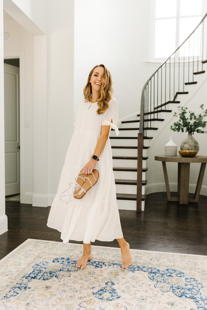 white dress with curved staircase