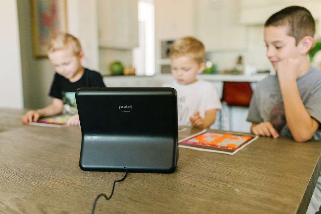 boys at kitchen table with facebook portal indoor activities for kids