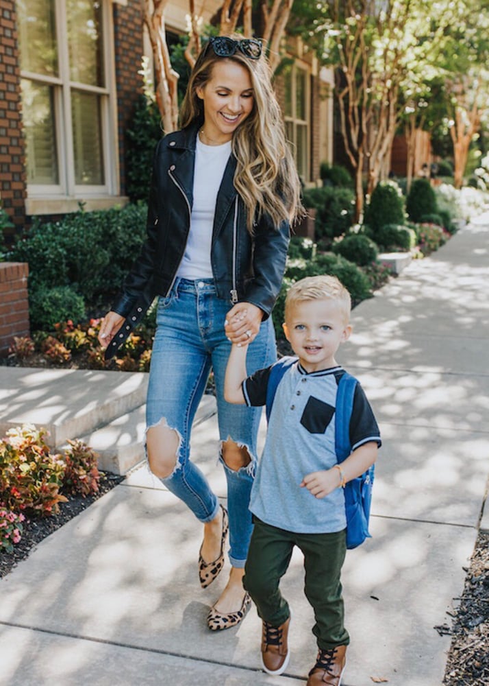 black leather jacket and jeans outfit