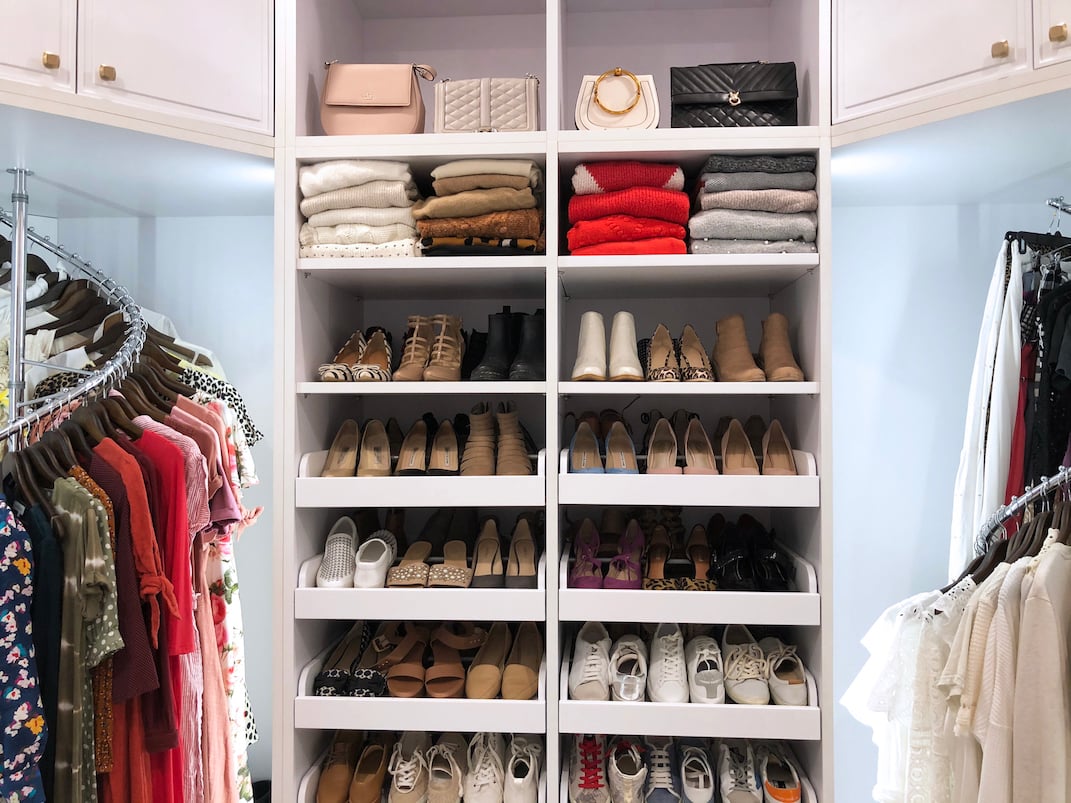 women's closet with shoe wall