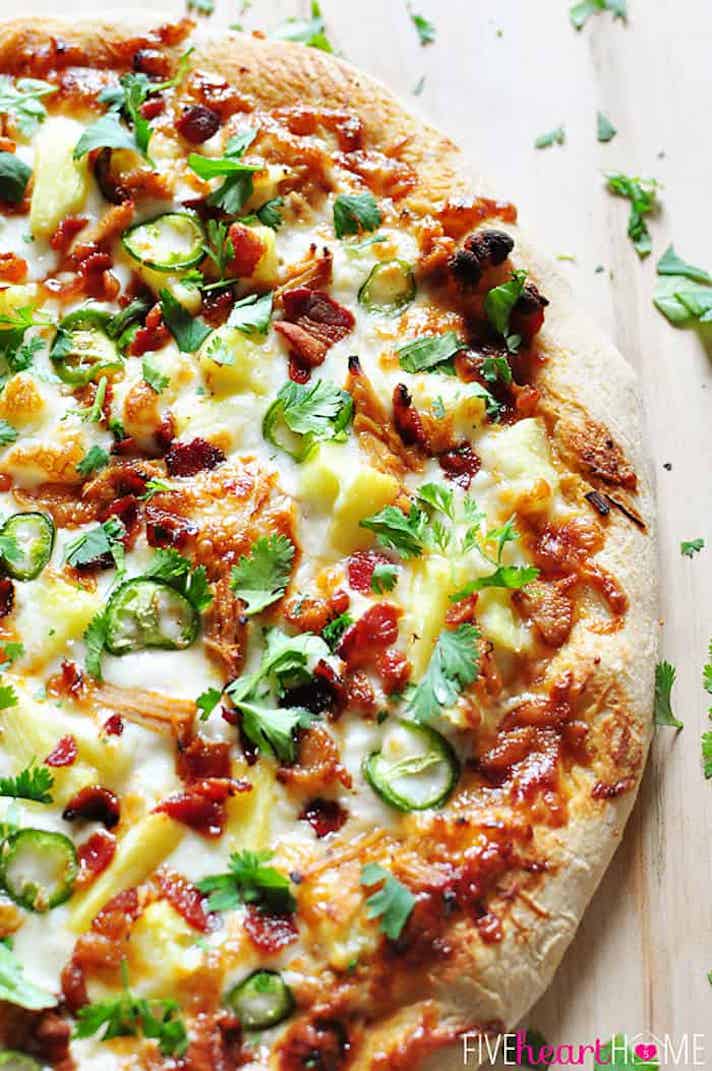 pineapple pulled pork pizza with bacon jalapenos and cilantro
