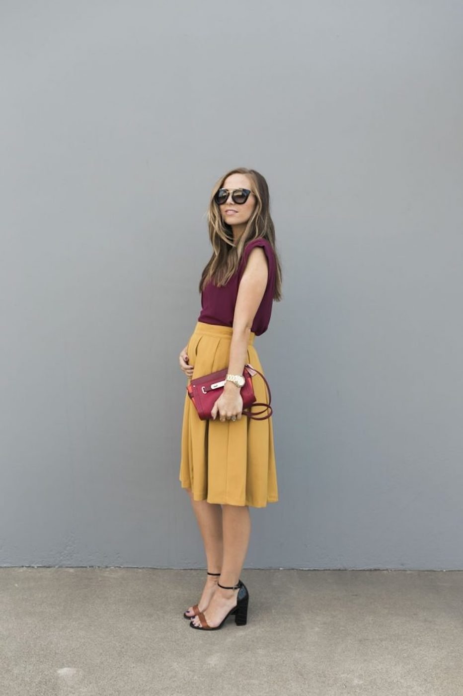 burgundy top and mustard skirt