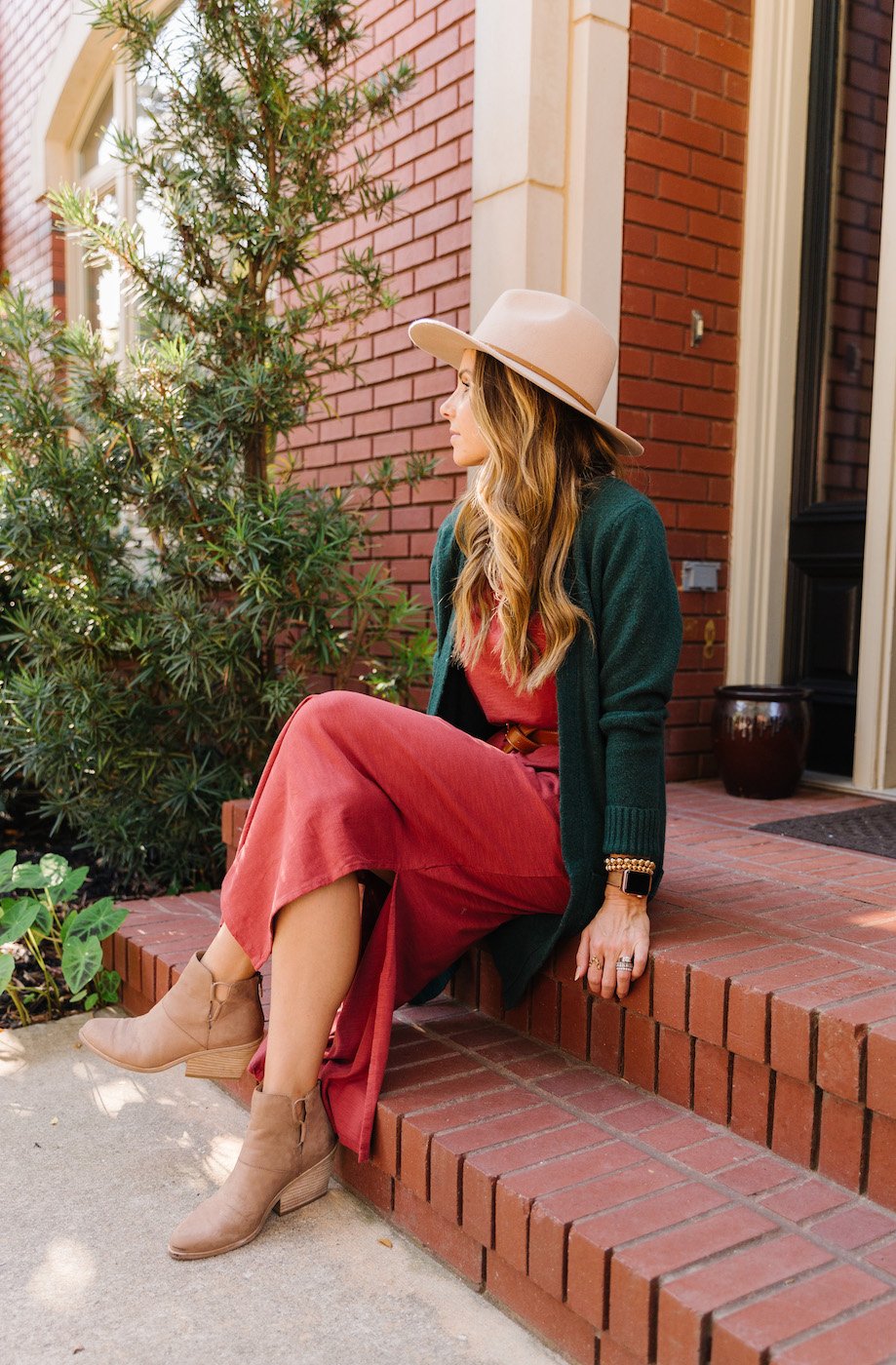 red dress and dark green sweater