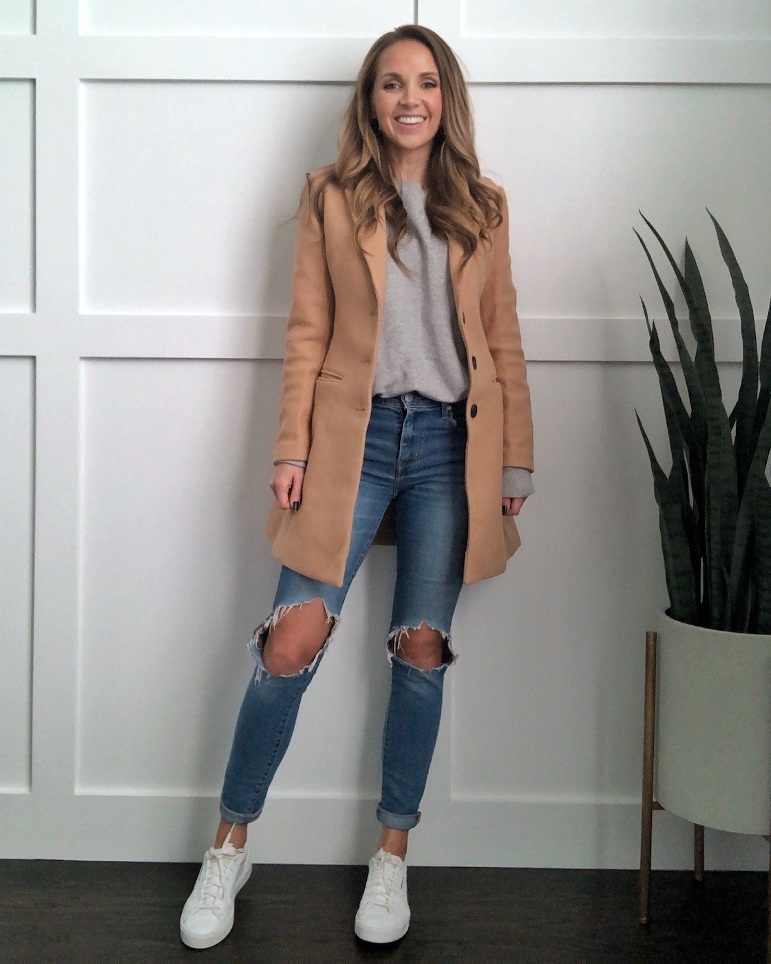 camel coat outfit with jeans and gray sweatshirt