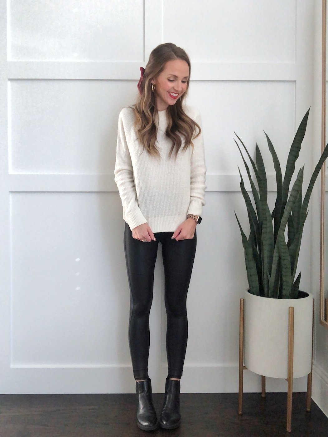 leather leggings and white sweater