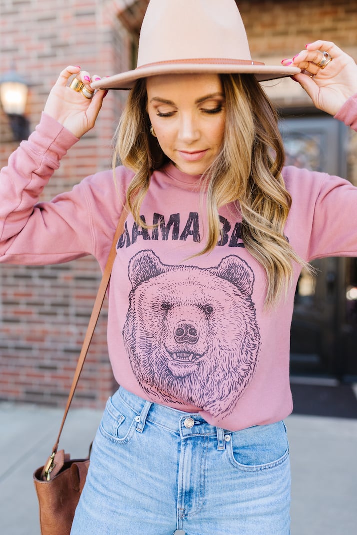mama bear sweatshirt with jeans and hat