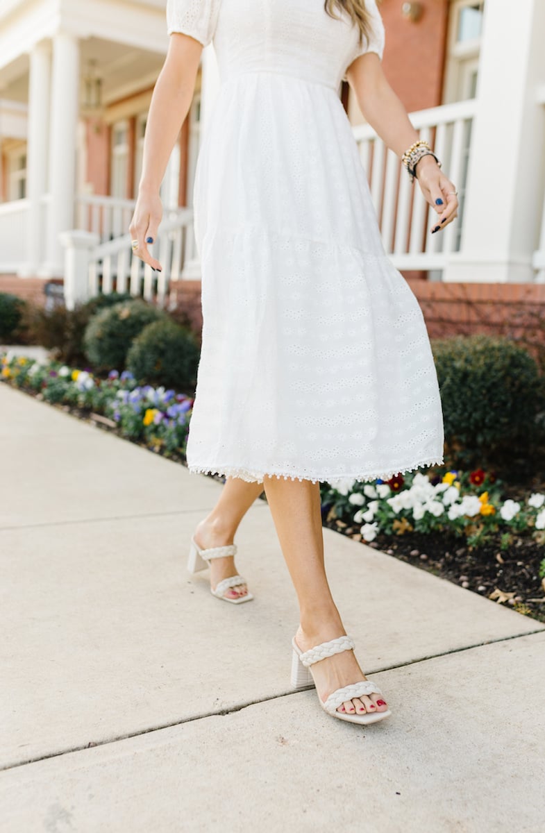 white eyelet dress and braided heeled sandals