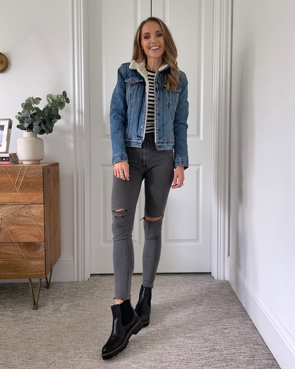Denim jacket with gray jeans and black boots