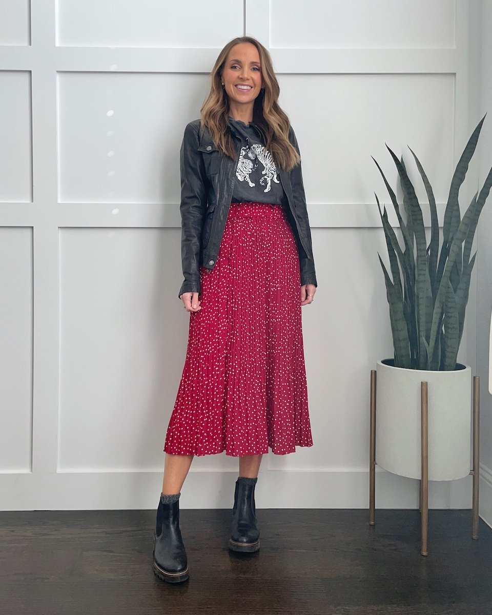 chelsea boots with midi skirt and leather jacket