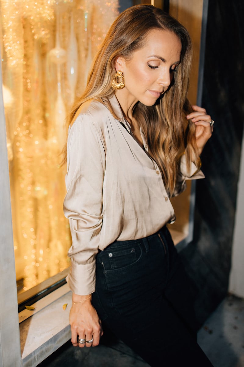 black straight leg jeans with champagne shirt
