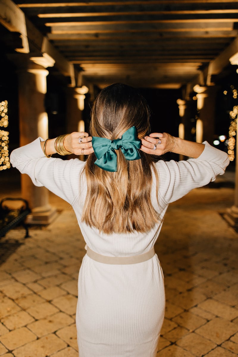 green bow with cream sweater dress