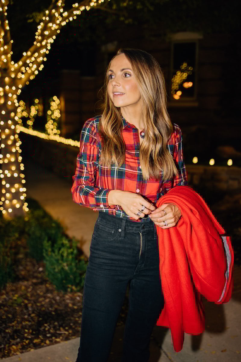 red coat with plaid shirt